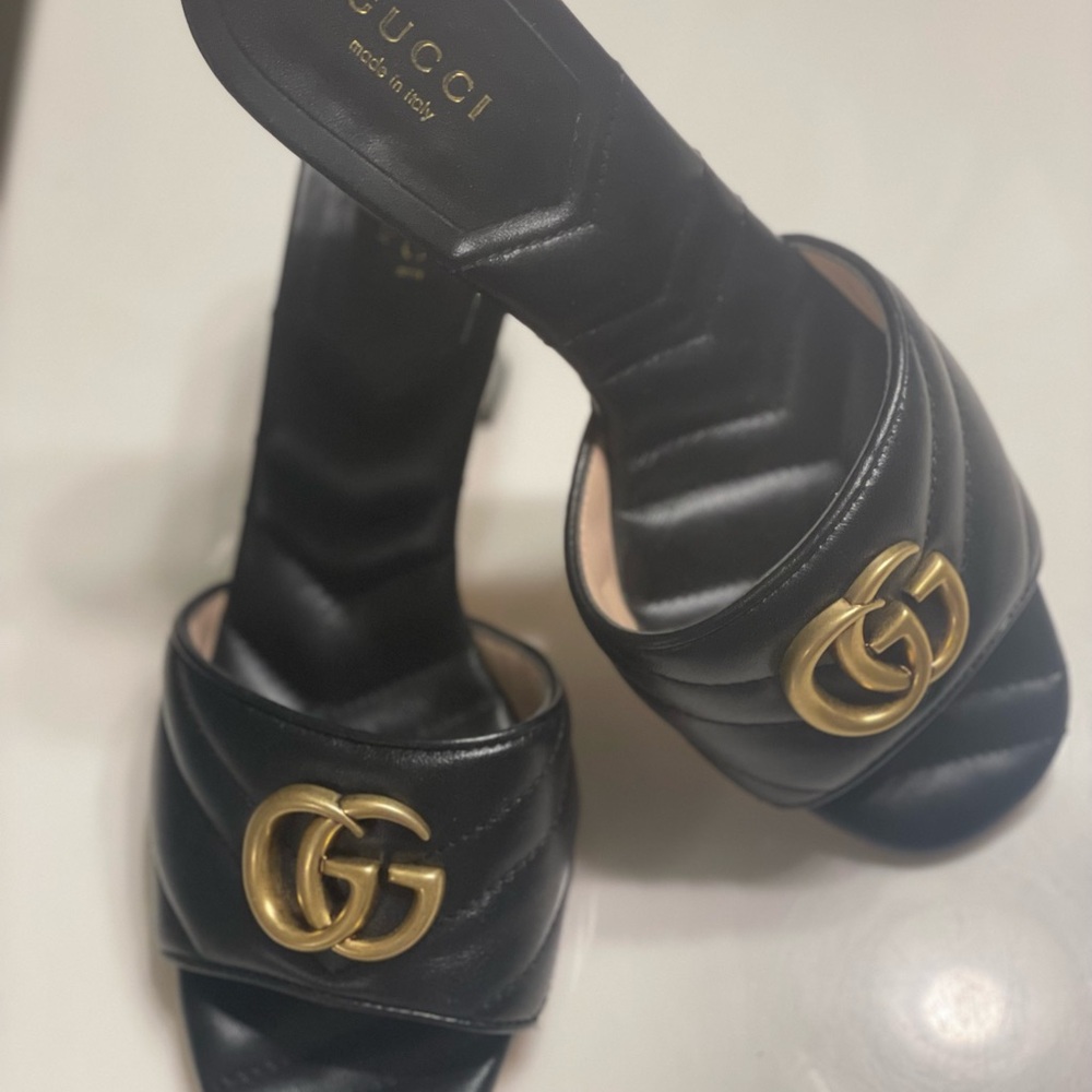 Gucci Black and Gold Mules with Iconic Logo